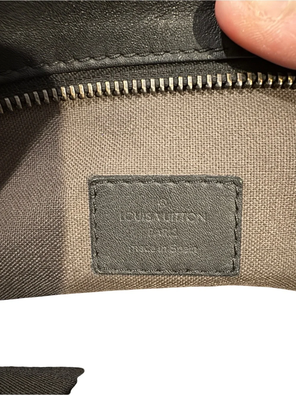 The Louis Vuitton N41565 Damier Infini 7DW (Seven Days a Week)